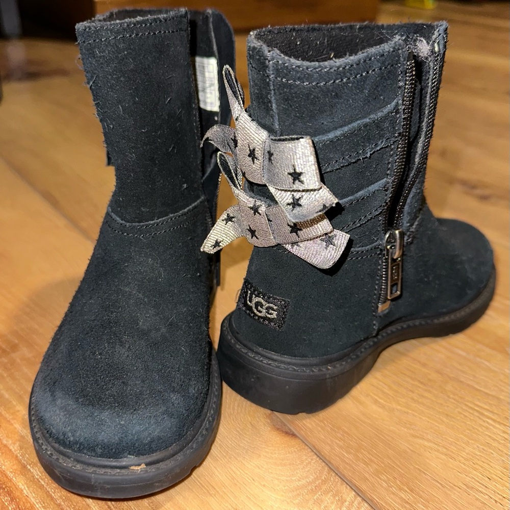 Kids Ugg boots with bow detail.